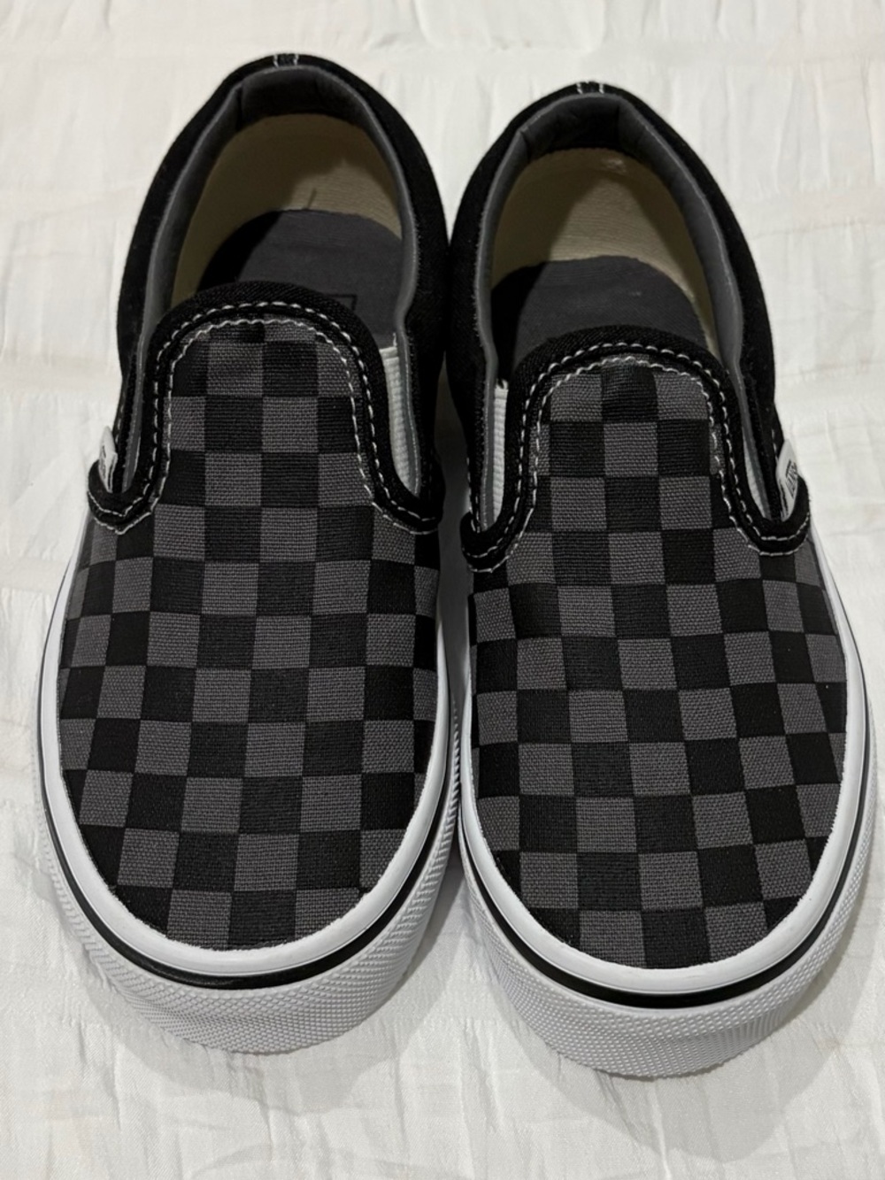 Vans Kids Checkerboard Slip-On Sneakers in Black and Gray